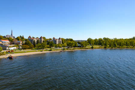Panoramic view of a city with a lakeの写真素材