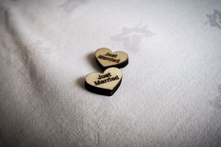 just married hearts on a tableの写真素材