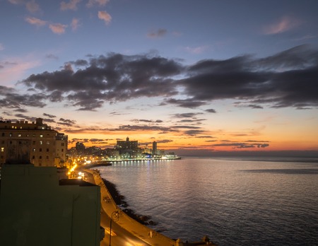 Sun setting over the Malecon, Havana, Cubaの写真素材