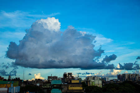 Beautiful clouds over the cityの写真素材