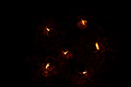 Floor decorated with flowers and diyas on the occasion of diwaliの写真素材