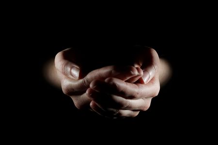 Hands together holding nothingの写真素材