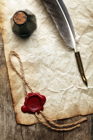 Blank paper with wax seal, quill & inkの写真素材