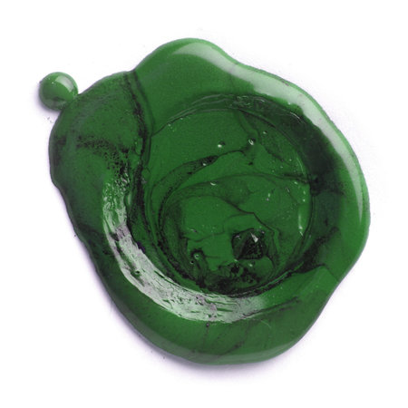 Green wax seal isolated on whiteの写真素材