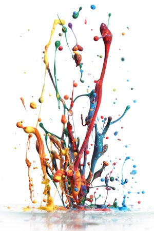 Colorful paint splashing isolated on whiteの写真素材