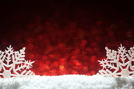 Christmas background with snow and snowflakesの写真素材