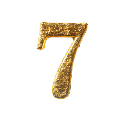 Alphabet and numbers in gold leaf isolated on white