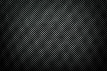 Dark carbon fiber backgroundの写真素材