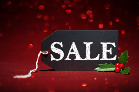 Sale price tag on red glitter backgroundの写真素材