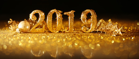 2019 in sparkling gold numbers celebrating the New Yearの写真素材