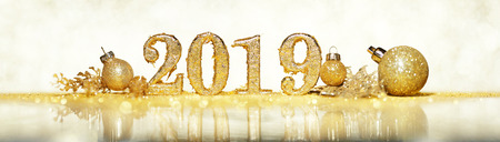 2019 in sparkling gold numbers celebrating the New Yearの写真素材