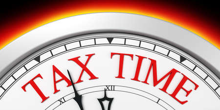 Tax time deadline on a clockの写真素材