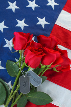 American flag with roses and military dog tags with text - Memorial Dayの写真素材