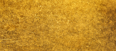 Rough metallic golden surface texture. Shiny gold crinkled background.の写真素材