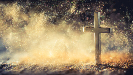 Religious cross in abstract wallpaper with shining gold sparkles and radiant lights. Symbolism of heaven or the resurrection.の写真素材