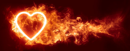 Glowing heart in an inferno of red hot flames wallpaper or Valentine's background. Symbolizing passion, lust, or desire.の写真素材