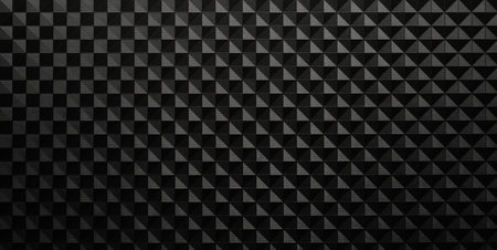 Dark textured carbon fiber background.の写真素材