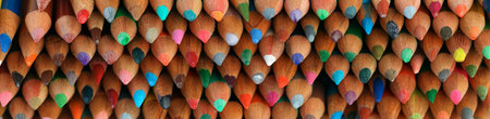 Collection of used and worn colored pencils. Art school background.の写真素材
