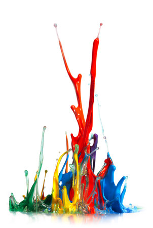 Abstract paint and ink in a rainbow of colors splashing into the air, frozen motion in a creative and unique shape. Isolated on white.の写真素材