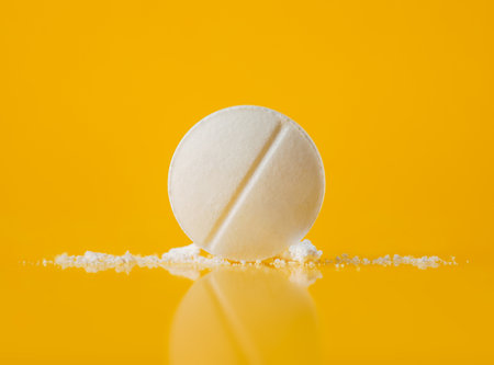 Close up of single pill tablet. Single dose drug prescription or medicine.の写真素材