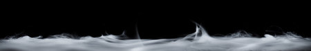 Floor covered in smoke or fog swirling upwards. Dramatic smoke or fog effect for spooky Halloween background.の写真素材