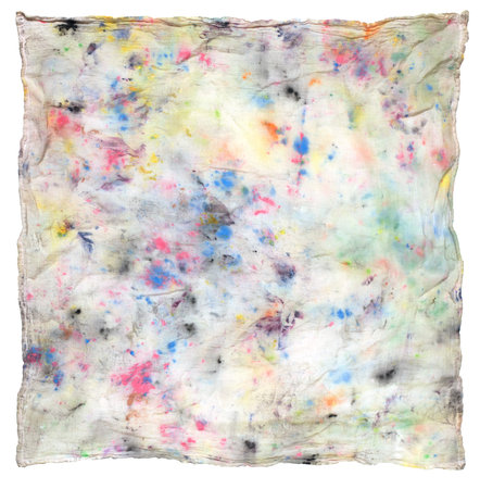 Old grungy rag covered in paint and ink stains. Isolated on white.の写真素材