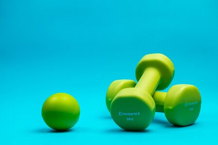 Fitness weights, apples and vitamins to exercise and stay healthy and fitの写真素材