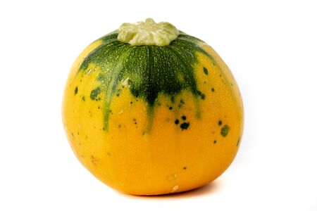 Fresh yellow and green zucchini, courgettes, squash isolated on white backgroundの写真素材