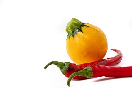 red hot chili peppers and zucchini isolated on white background. Set or collectionの写真素材