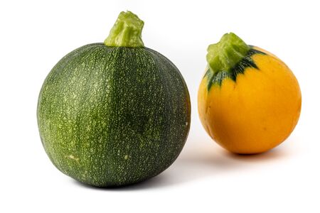 Fresh yellow and green zucchini isolated on white background. Yellow courgettes. Yellow squash.の写真素材