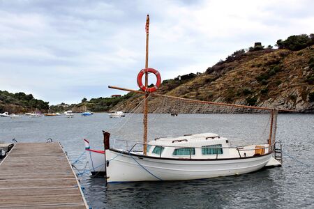 boat with lifebuoy in the lagoonの写真素材