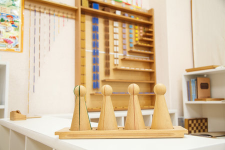 Wooden cones for Studying Fractions against the background of the material for the study of mathematicsの写真素材
