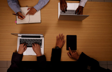 Top view of businessman hand working with new modern computer tablet and notebook, Young creative...