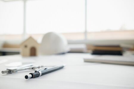 Desk of Engineering project in construction site or office. Construction concept. Engineering tools.の写真素材