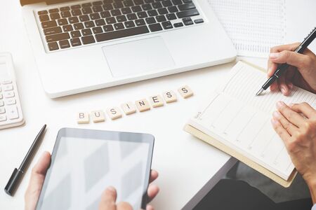 Business concept. Crossword to complete the mission (selective focus).の写真素材