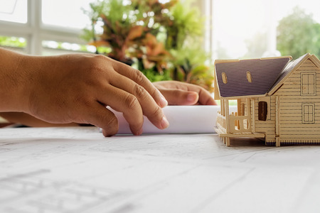 Desk of Engineering project in construction site or office. Construction concept.Engineering tools.Vintage tone retro filter effect,soft focus(selective focus)の写真素材