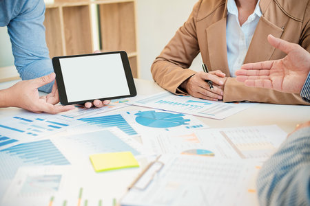 Business working at office with laptop and documents on his desk. Business concept.の写真素材