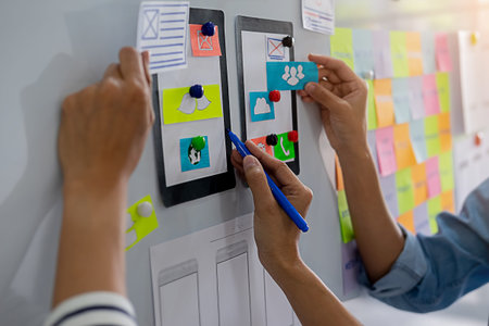 Creative Web Designer planning application and developing template layout, framework for mobile...