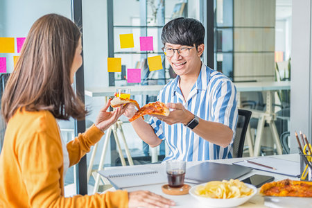 Beautiful Asian Business Using Laptop Computer Online Working from Homeの写真素材