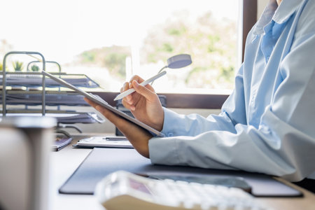 businessman working with tablet computer at office. business and technology conceptの写真素材