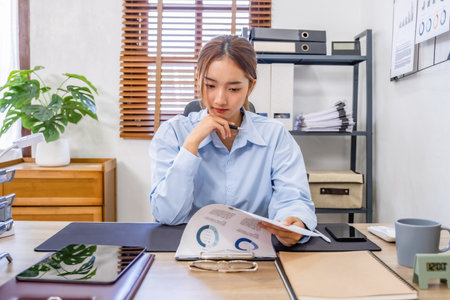 Asian business woman working in the office. Work from home concept.の写真素材