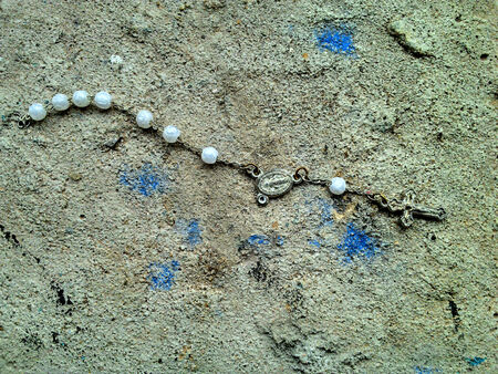 Old chaplet in the cementの写真素材