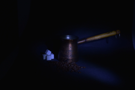 Turk and sugar to prepare a delicious flavored coffeeの写真素材