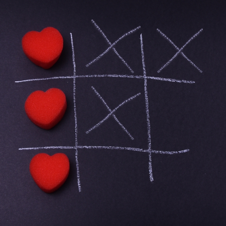 photo on dark background, heart and cross, symbols of love, heart, red, symbol, cross, together, background image,の写真素材