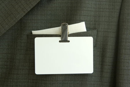 Business man in  suit with name tag, insert your own text etc.の写真素材
