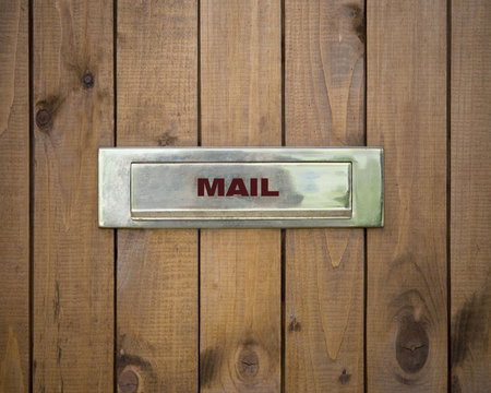 mailbox on wooden fenceの写真素材