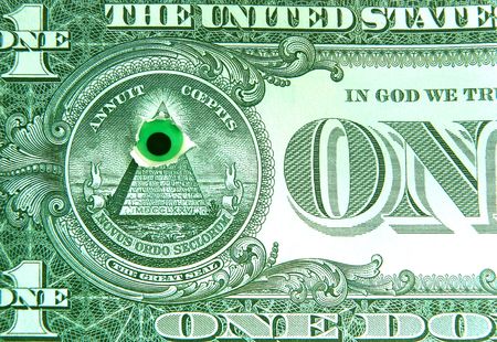 The eye observes of the finance and the world from a dollar pyramidの写真素材