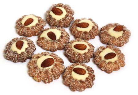 Cookies with an almond nut and a coconut shavingの写真素材