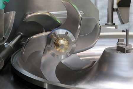 Industrial meat grinder close up - mincing-machineの写真素材