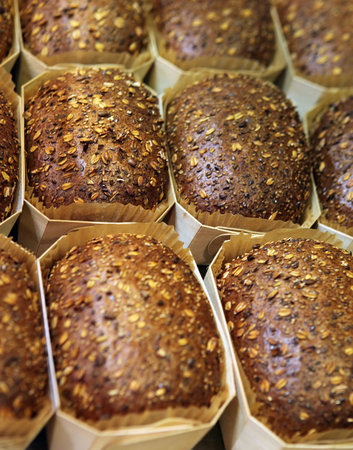 Fresh elite grain bread in forms for shop